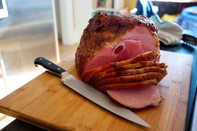 How can you tell if a precooked ham has gone bad?