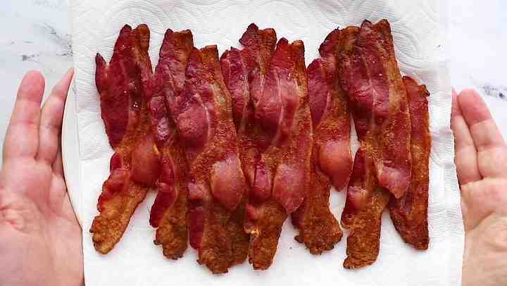 Is bacon safe to eat if not crispy?