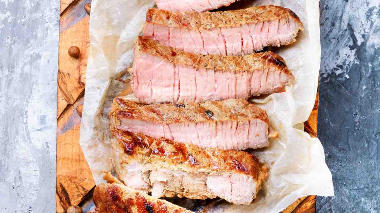 Is pork cooked when its white?