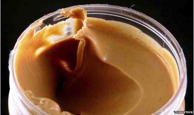 What are the black specks in peanut butter?