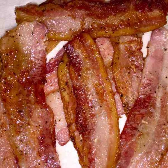 What happens if you eat a little bit of raw bacon?