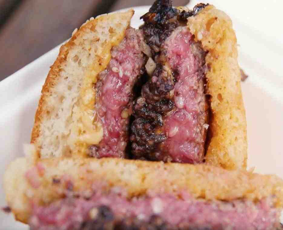 What happens if you eat a raw hamburger?