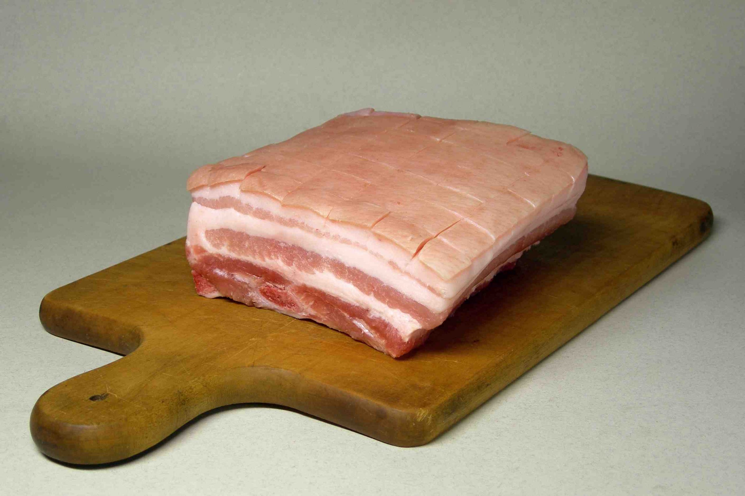 What is the color of fresh pork meat?