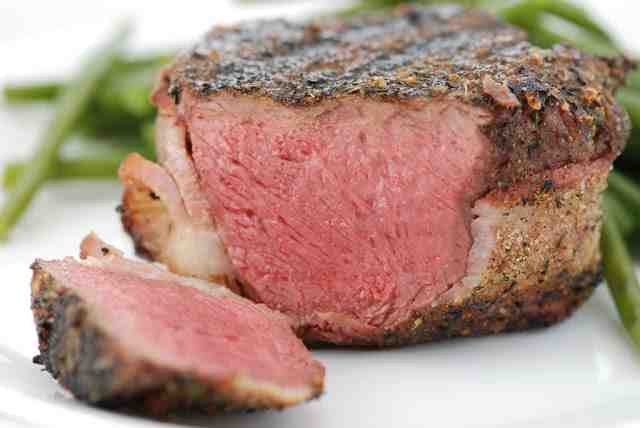 What makes a steak pink?