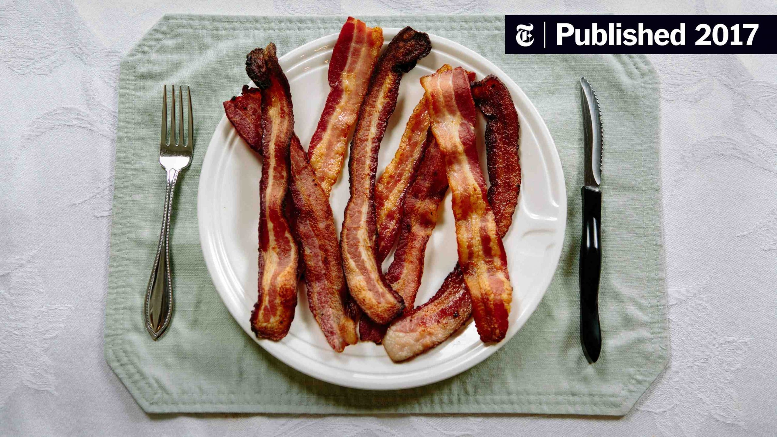 When was bacon invented in America?