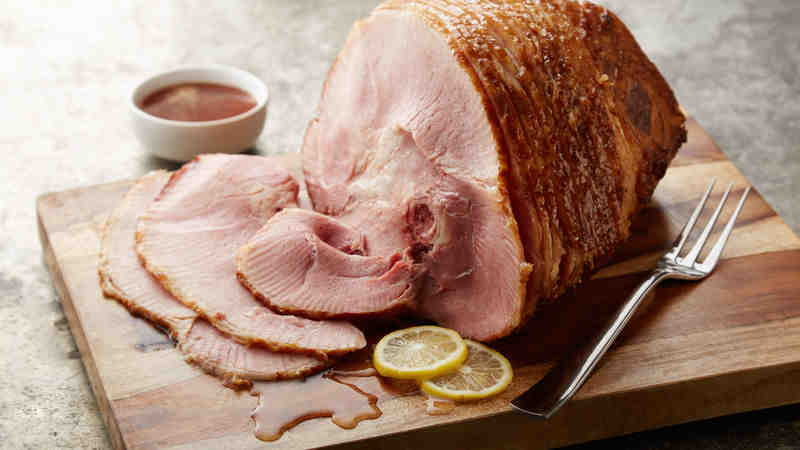 How long do you cook uncooked ham?